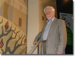 Umberto Bruni with his work prior to its removal. Photo: Moira McCaffrey, 2008.
