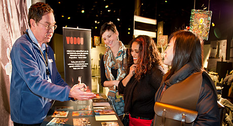 Photo of one of our Volunteer Interpreters in action in the Vodou exhibition. Canadian Museum of History, photo Frank Wimart, IMG2012-0385-0010
