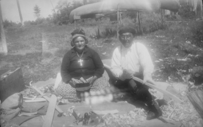 Damien Mestokosho and his wife Agathe building a canoe. Photo taken in Mingan in 1952 by William F. Stile. National Museum of the American Indian, Heye Foundation