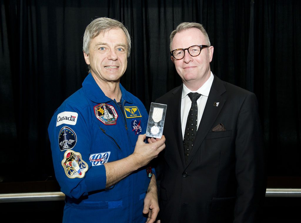 Canadian astronaut Dr. Robert Thirsk visited the Museum on December 15, 2014, where he was reunited with the medal that he brought with him on his voyage to the International Space Station in 2009. Canadian Museum of History, IMG2014-0237-0016-Dm