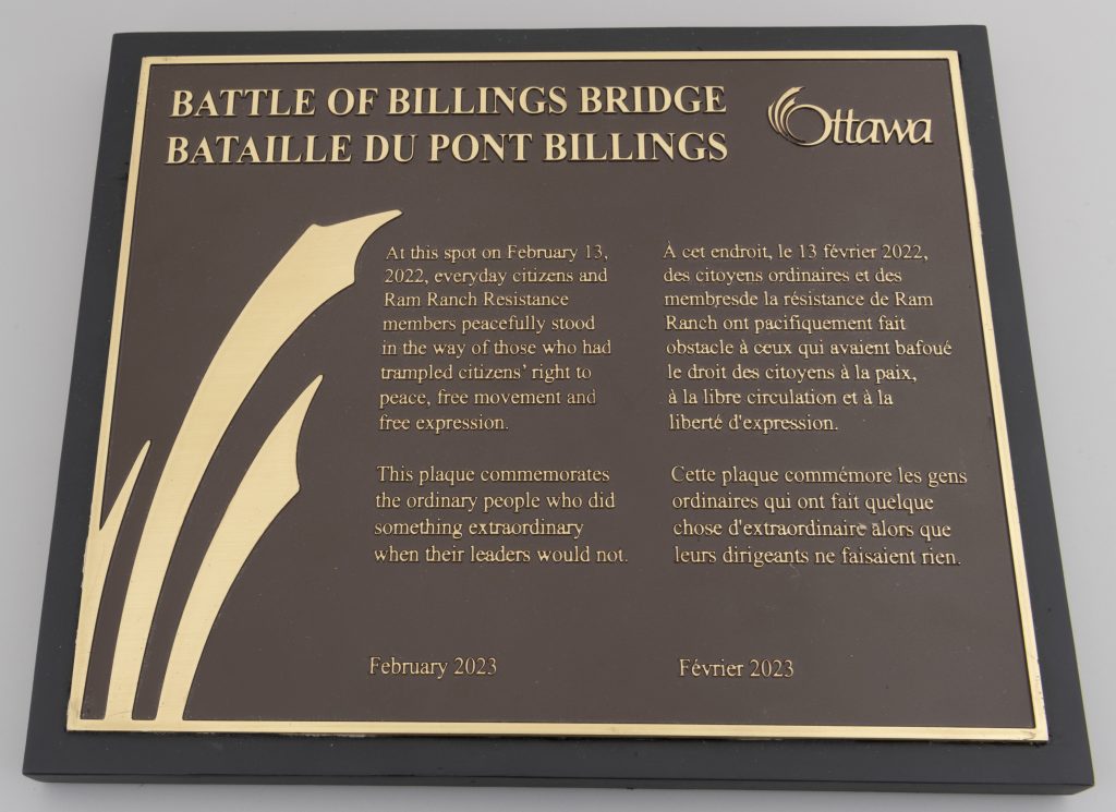 A brass plaque resembling an official heritage plaque, titled “The Battle of Billings Bridge.”