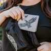 Polyester wallet with Soaring Eagle design from indigenous artist Corey Bulpitt.