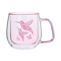 Colored doubled walled glass mug with hummingbird design by Simone Diamond