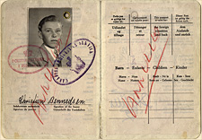 Inside pages from Chris Bennedsen’s Danish passport.