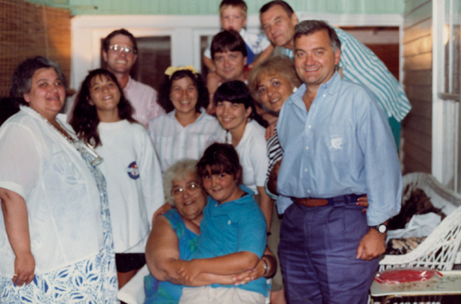 Connie Bennedsen (left) and Chris Bennedsen (top right) with members of the Colangelo family 