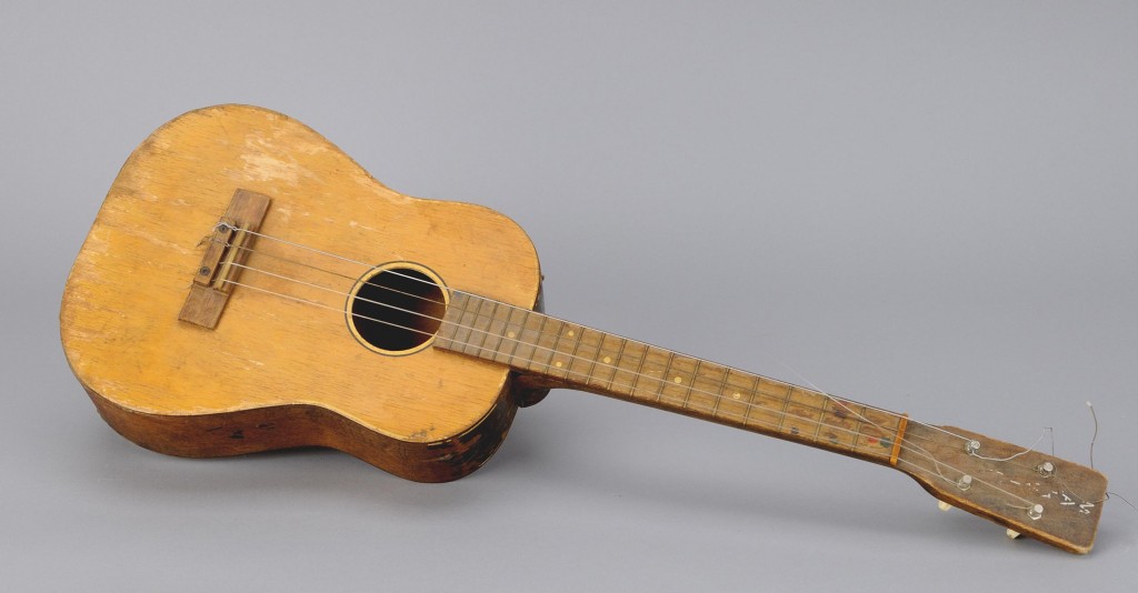 Bill Mason plays this guitar in the film Song of the Paddle. Canadian Museum of History, 2010.7.26, IMG2011-0181-0005-Dm