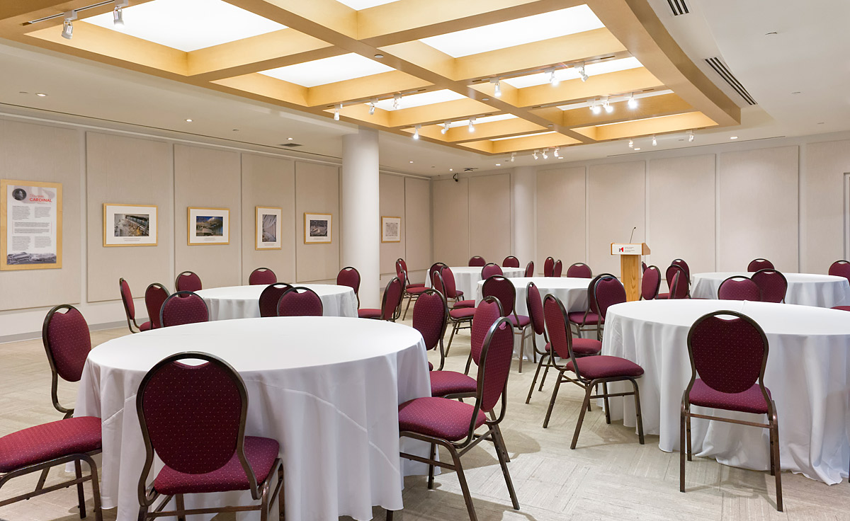 A large conference room at the Canadian Museum of History in Ottawa, with tables and chairs.