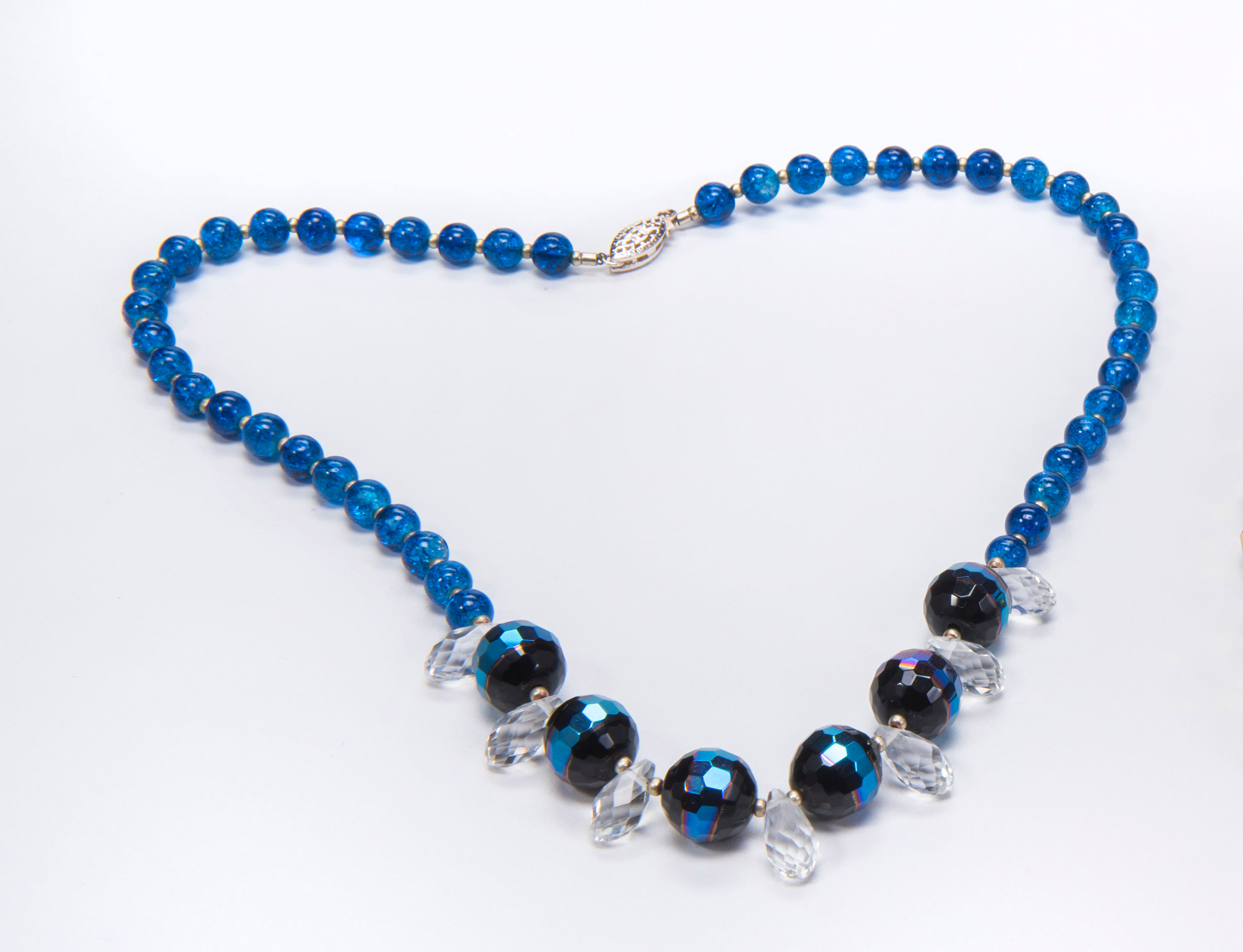 A necklace with blue glass beads and crystals displayed in the Canadian Museum of History in Ottawa.