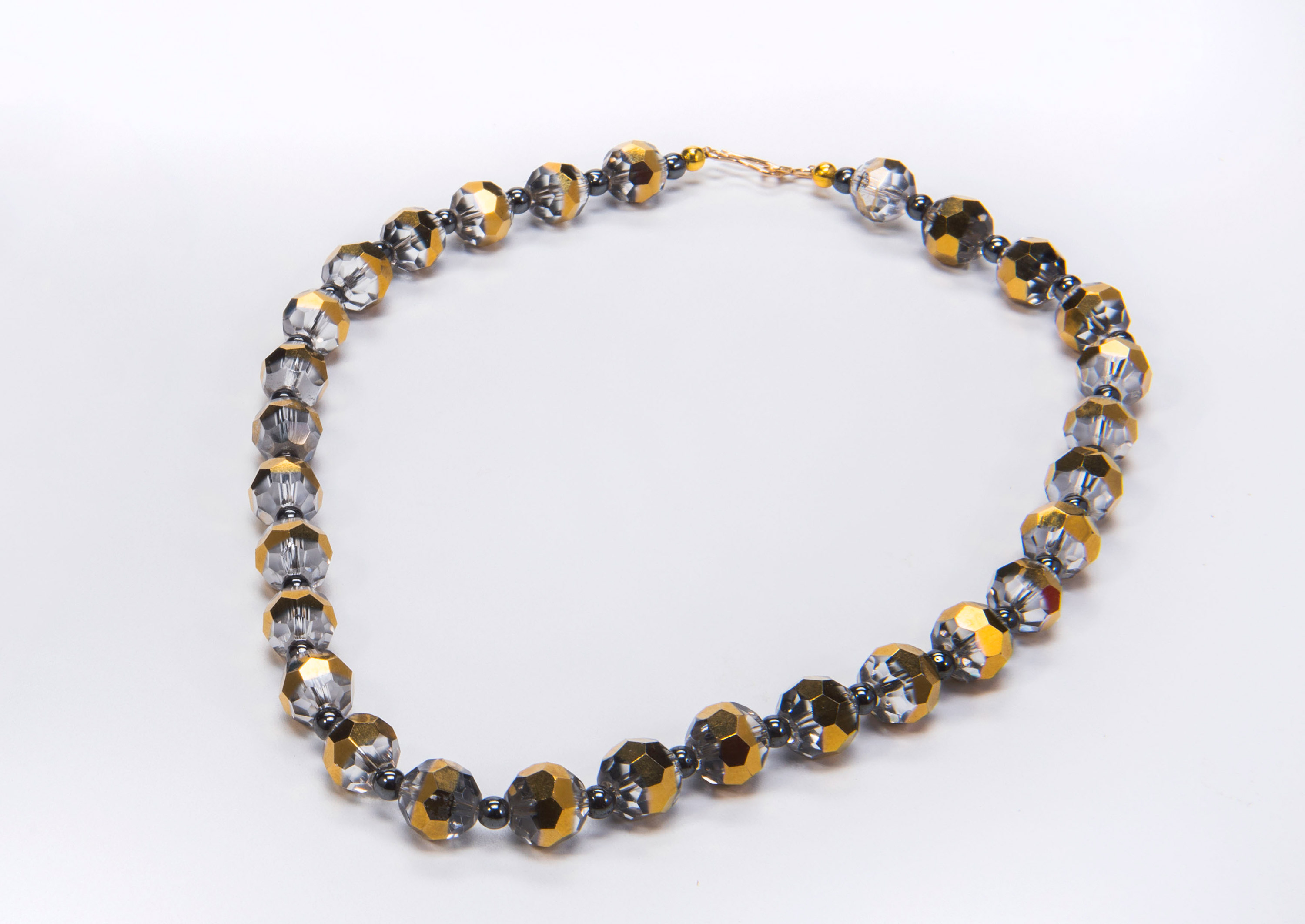 A necklace with black and gold beads on display at the Canadian Museum of History in Ottawa.