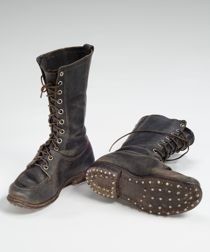 Leather log driver’s boots with metal studs on their soles.