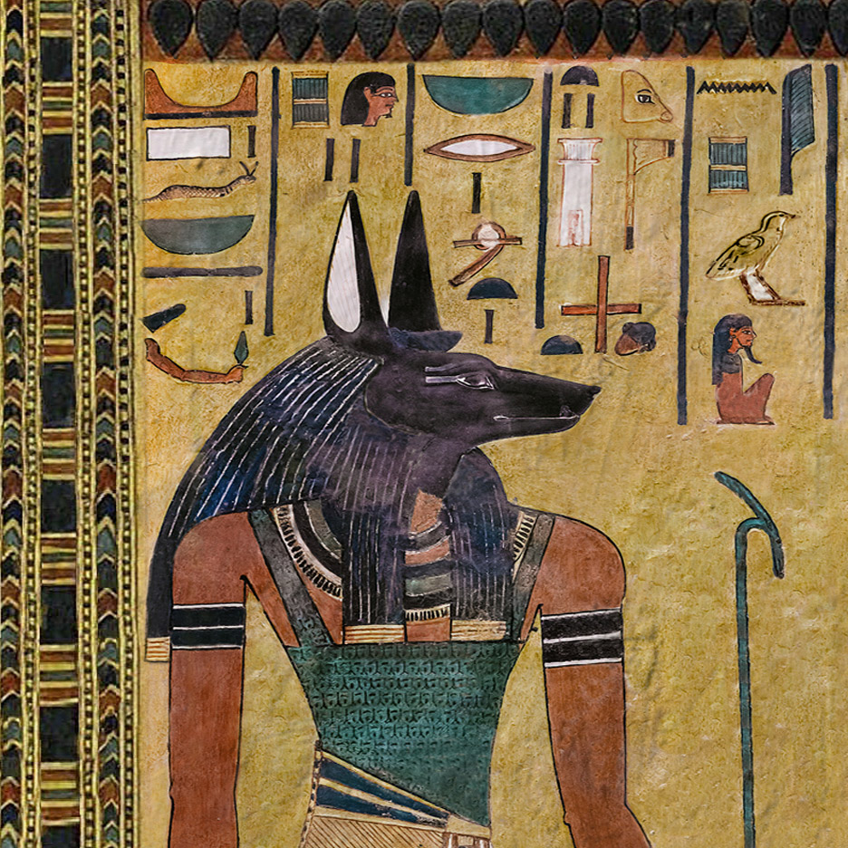 A tomb painting of a dog-headed god.