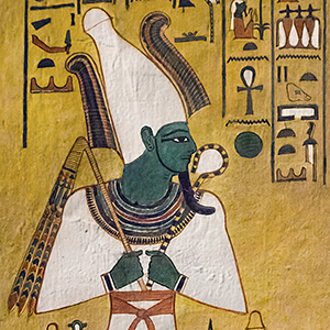 A tomb painting of a god with a white crown and green skin.