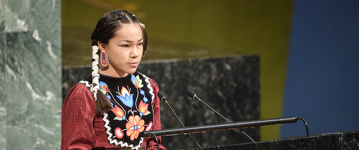 A young woman speaking at the Canadian Museum of History in Ottawa.