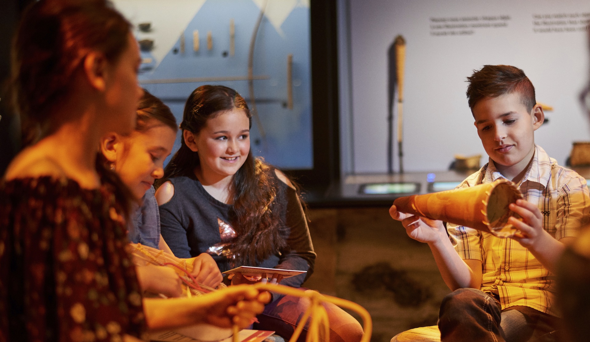 A group of children playing a musical instrument at the Canadian Museum of History in Ottawa.