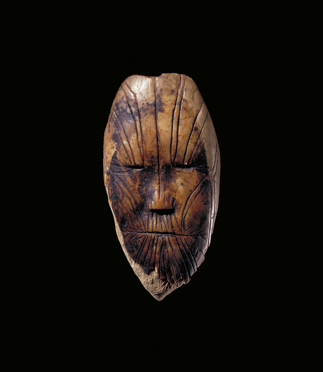 A wooden mask in the Canadian Museum of History.