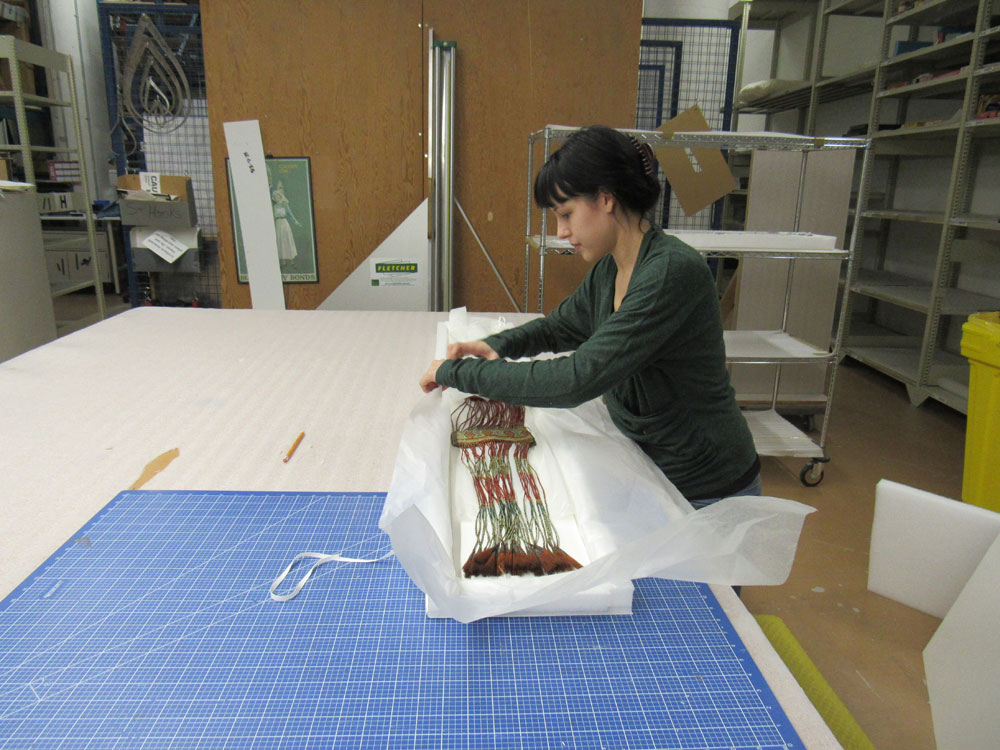 A woman is working on an artifact at the Canadian Museum of History in Ottawa.