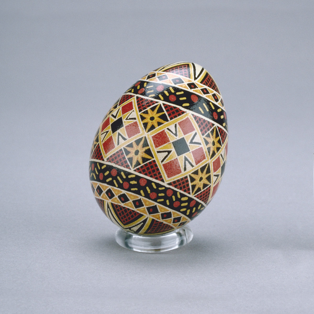 An easter egg with a colorful pattern on it, exhibited at the Canadian Museum of History in Ottawa.