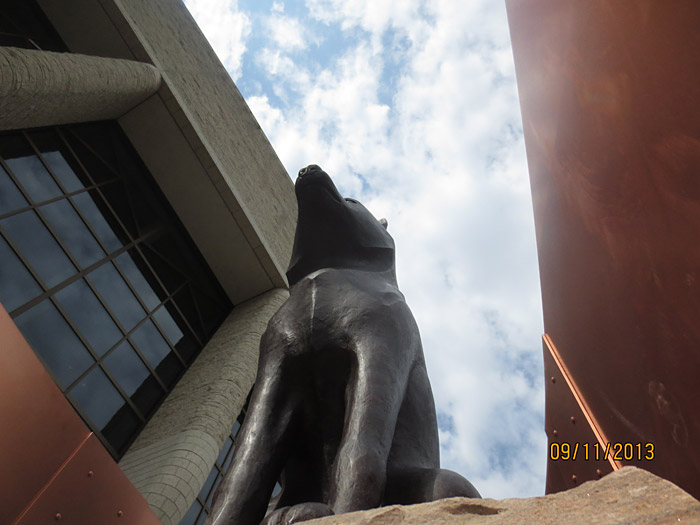 A statue of a dog in front of the Canadian Museum of History in Ottawa.