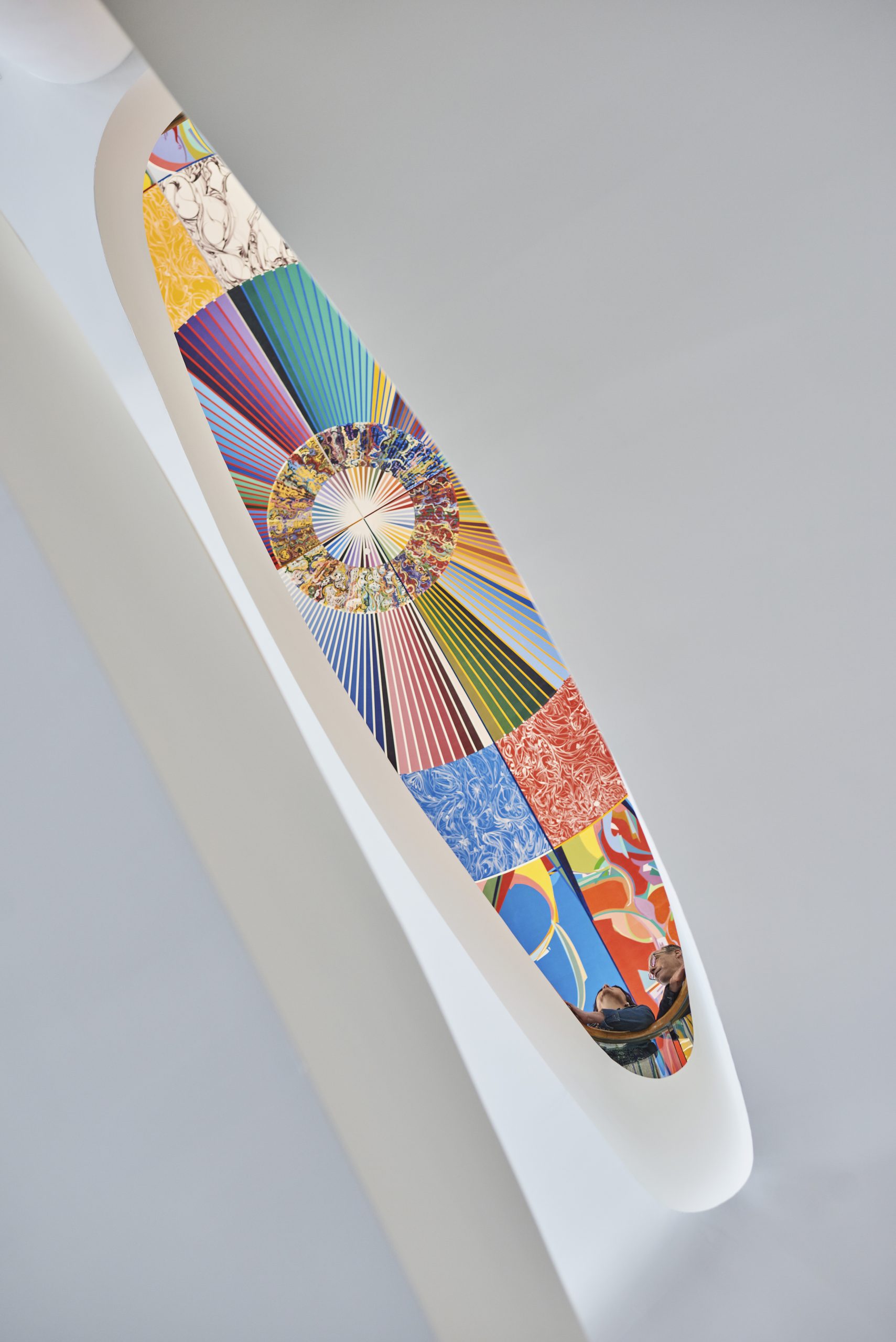 A surfboard with a colorful design on it at the Canadian Museum of History in Ottawa.