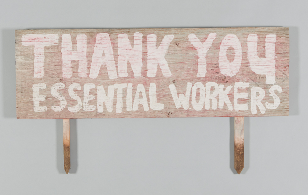 Lawn sign that says "Thank you essential workers"