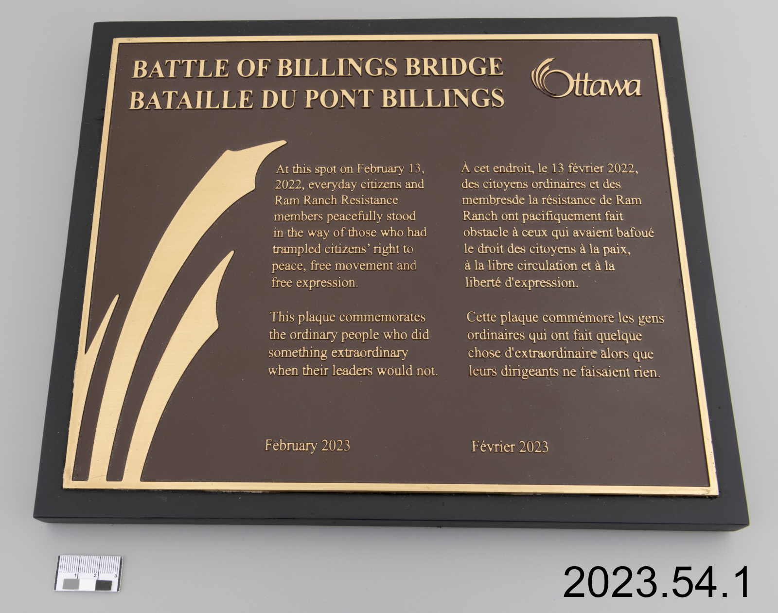 A brass plaque resembling an official heritage plaque, titled “The Battle of Billings Bridge.”