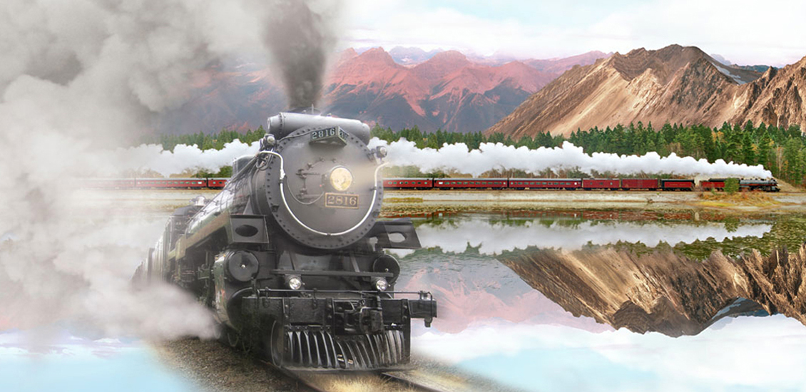 A steam locomotive and mountains