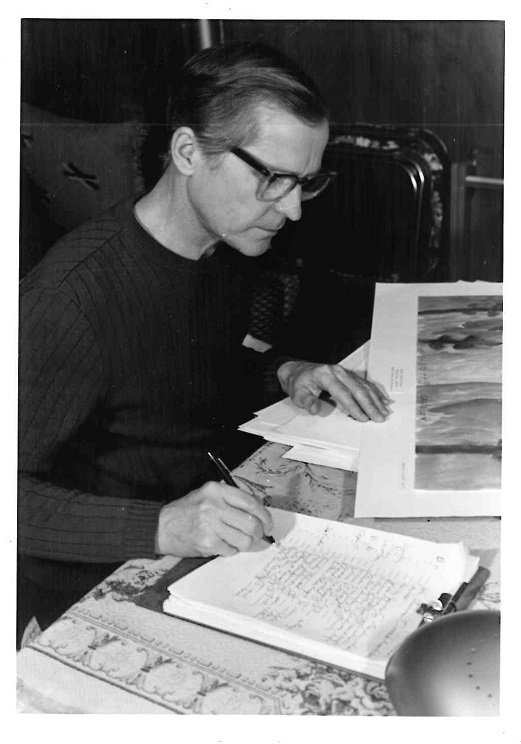 Black-and-white photograph of a light-skinned adult man looking at art and taking notes.